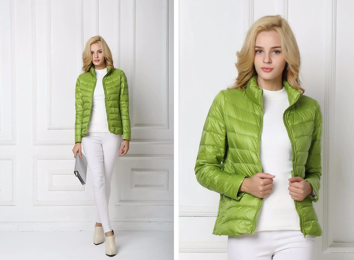 Full-length view of a women's urban chic puffer jacket, showcasing its flattering fit & modern style.