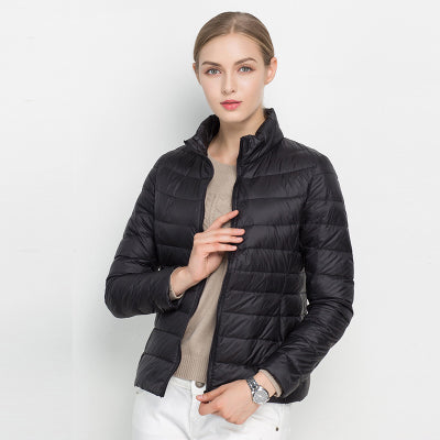 Modern women's lightweight puffer jacket, combining urban chic style with everyday comfort and warmth.