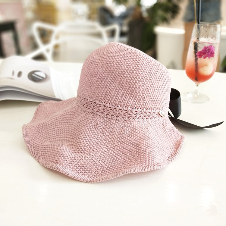 Trend-setting women's ponytail straw hat, offering ultimate UV protection, a must-have for summer