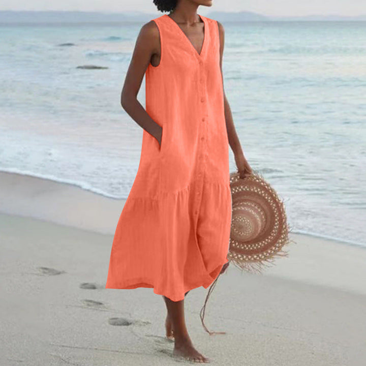 Flowing sleeveless V-neck midi dress featuring a button front & tiered design for women.