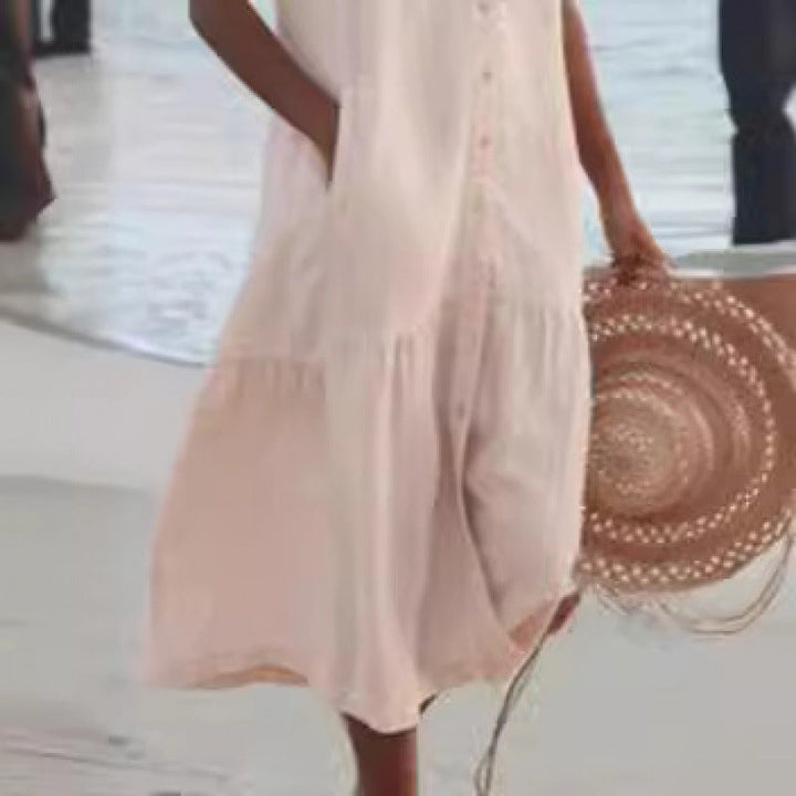 Versatile V-neck tiered midi dress with a button front, great for casual, beach, or everyday style.