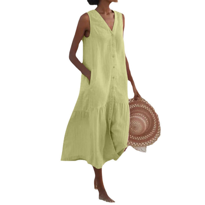 Women's V-neck midi dress showcasing tiered layers & a button front, a chic summer outfit.
