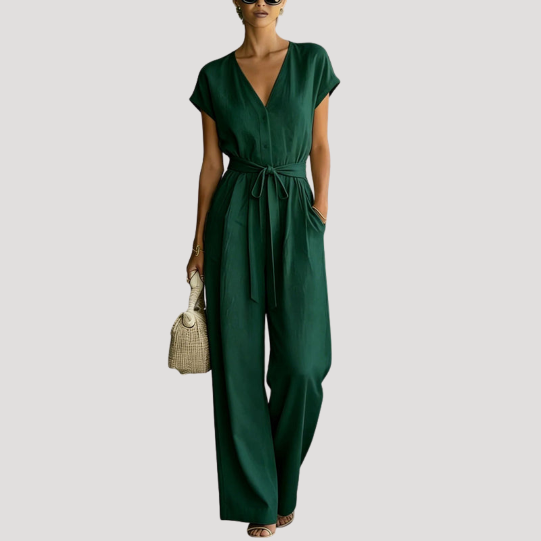 Chic women's V-neck cap sleeve wide leg jumpsuit with tie waist, an elegant one-piece for summer events.