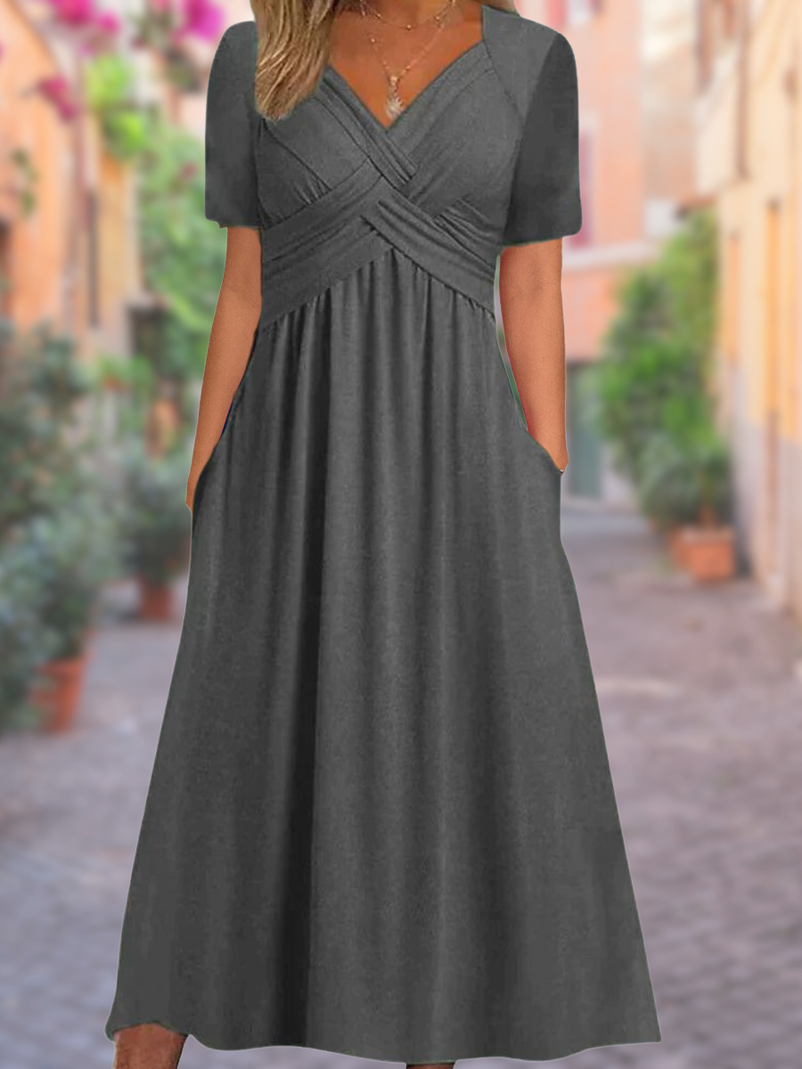 Versatile women's midi dress featuring a flattering V-neck and stylish crisscross design for spring.