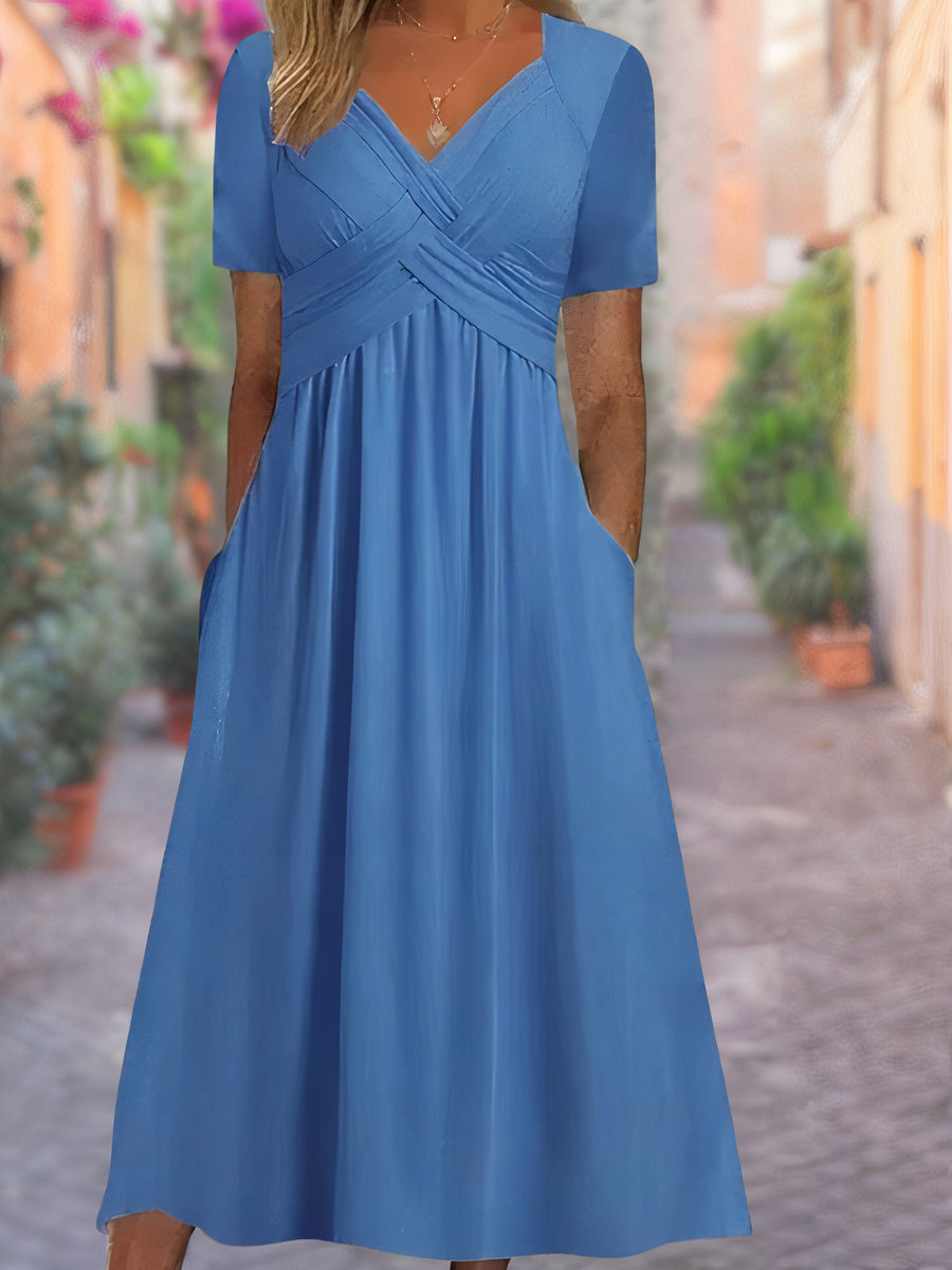 Sophisticated women's V-neck midi dress, showcasing a unique crisscross front for a chic summer outfit.