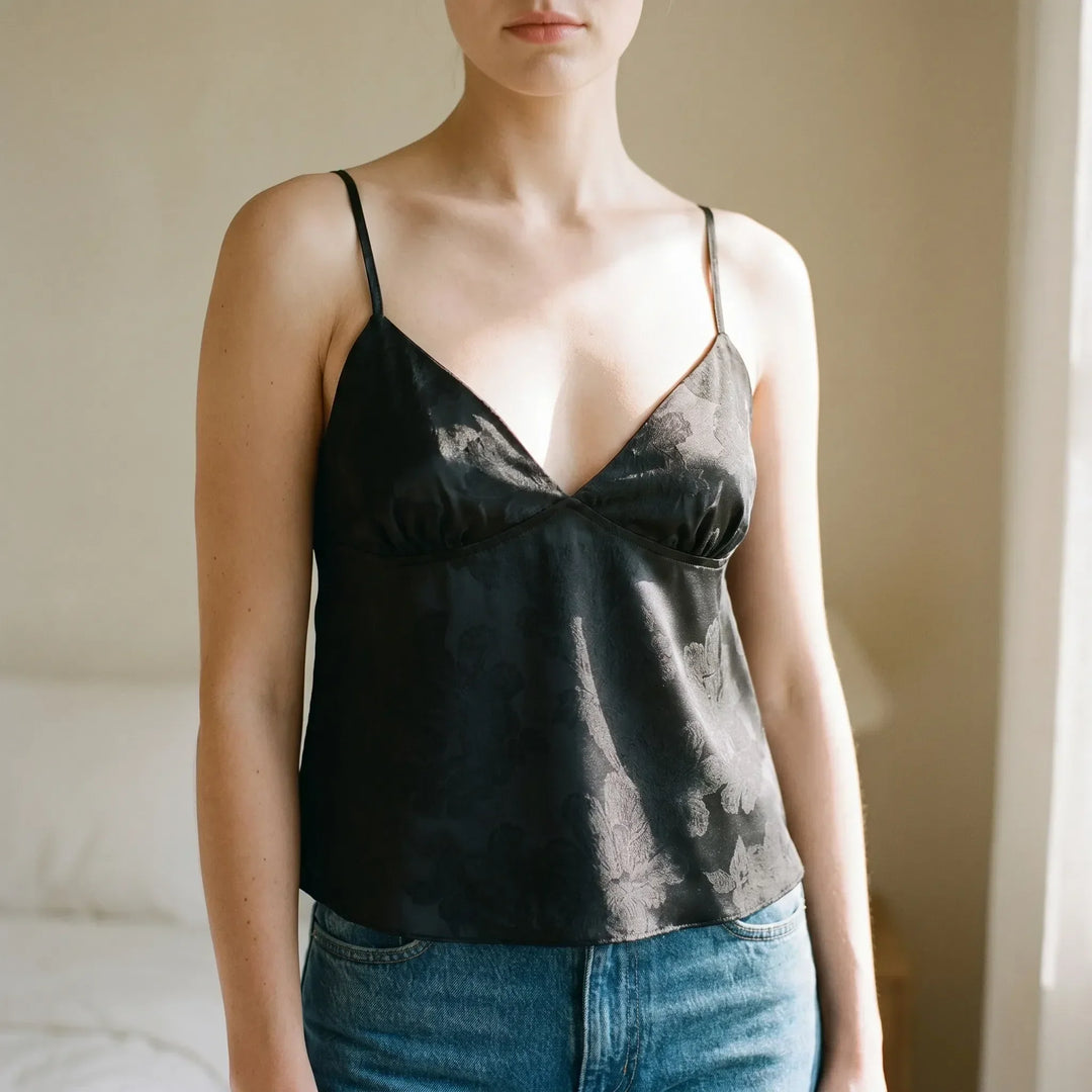 Women's V-neck jacquard cami top with spaghetti straps, elegant summer style.