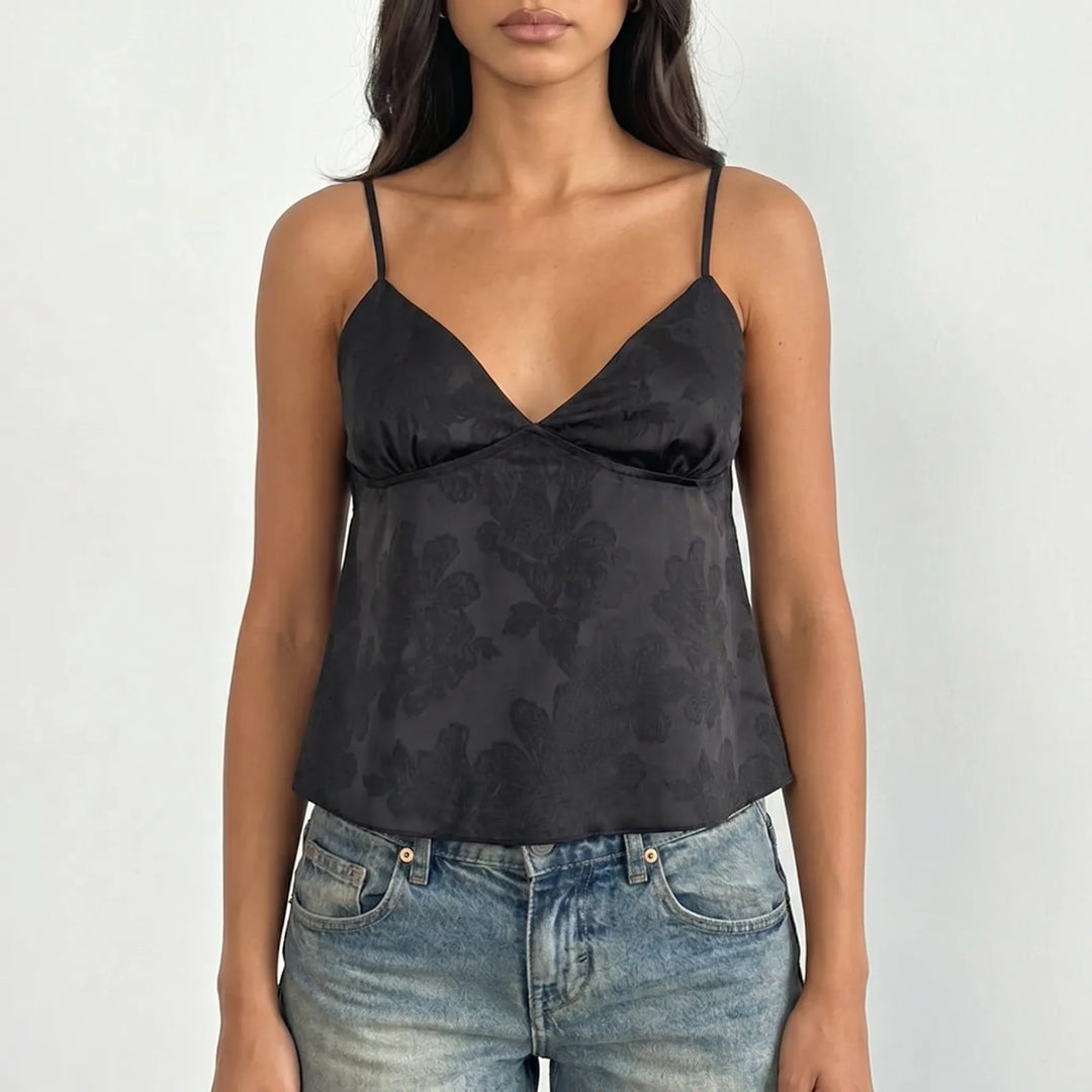 Versatile women's V-neck jacquard cami top, lightweight fabric, ideal for summer outfits.