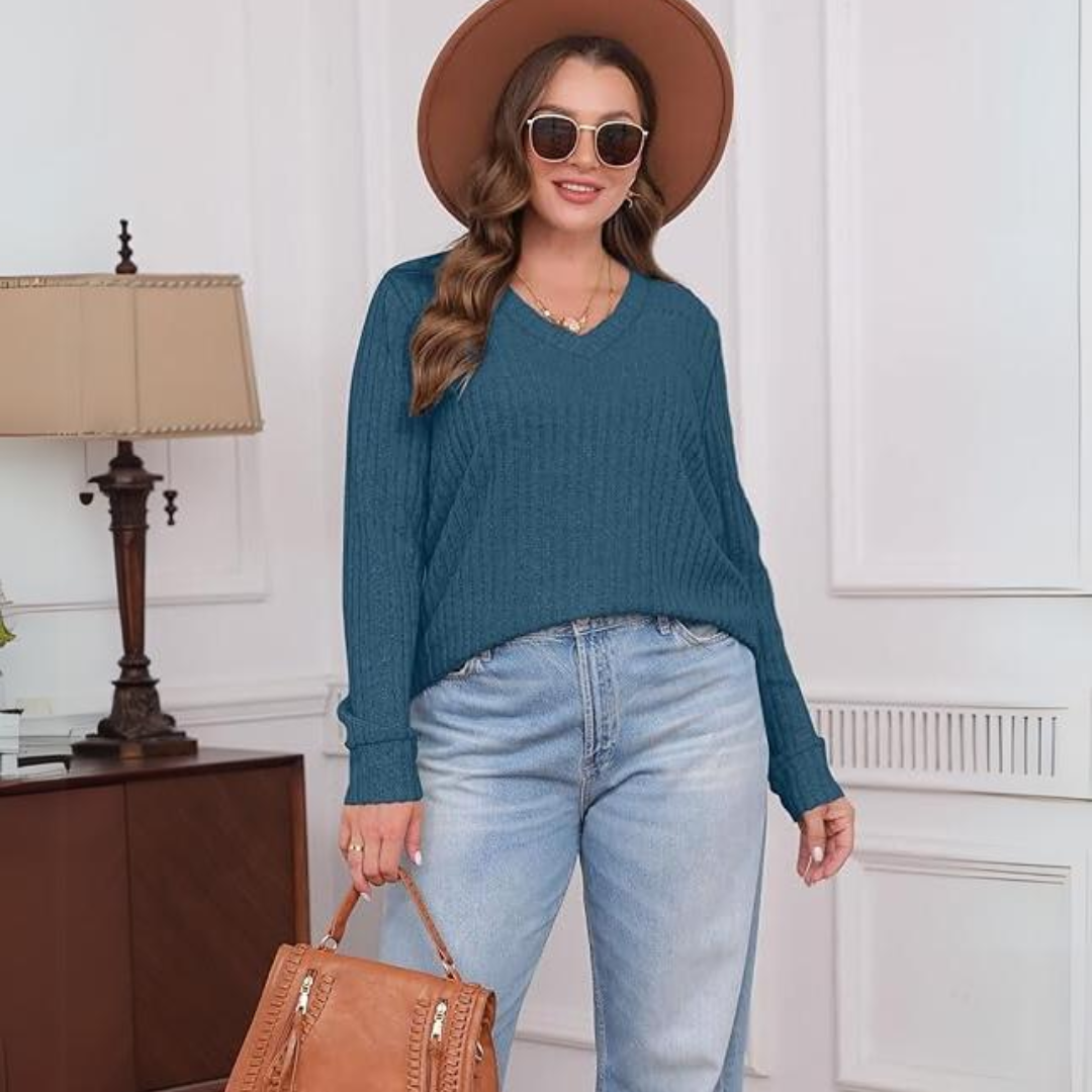 Women's lightweight V-neck tunic sweater, showcasing fine knit detail and a loose fit