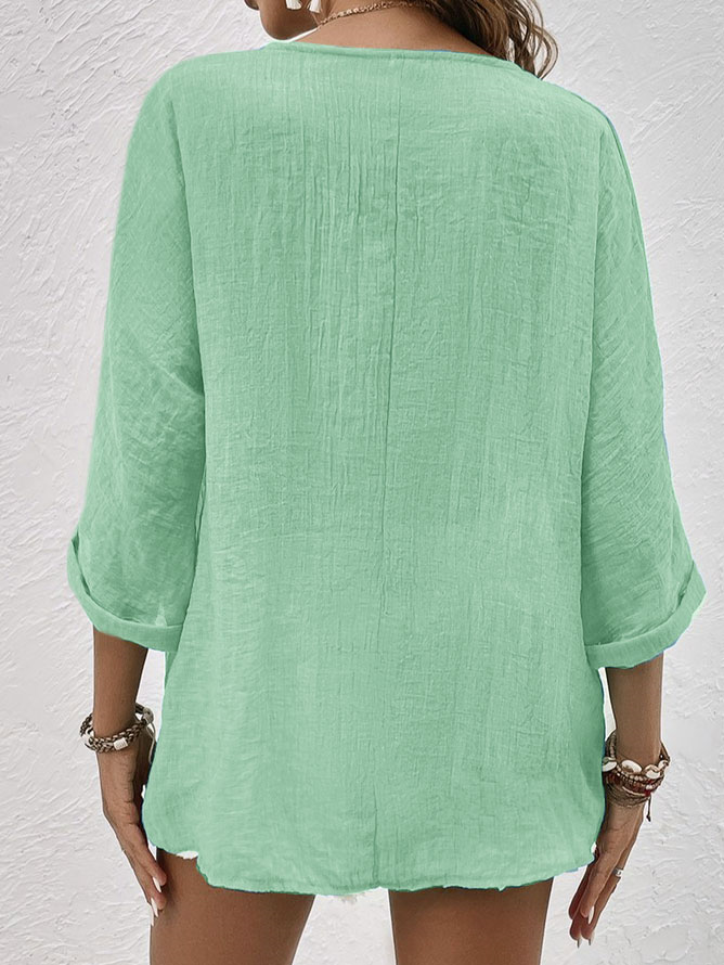 Relaxed fit women's V-neck long sleeve shirt, button-down blouse, comfortable for everyday spring & summer fashion.