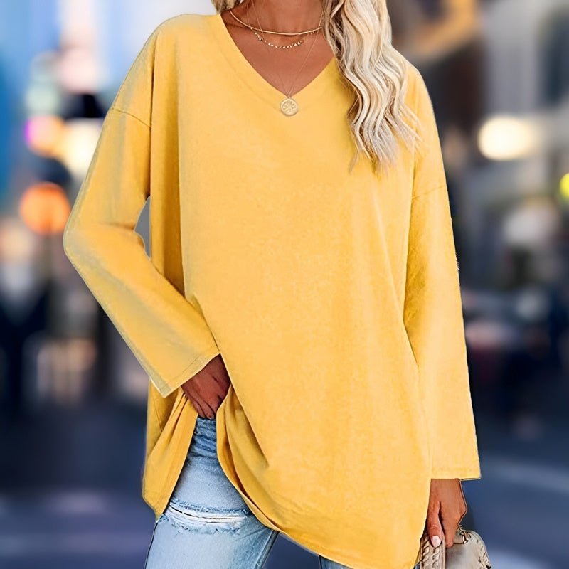 Women's V-neck long sleeve sweater in a relaxed fit, ideal for stylish and comfortable everyday wear.