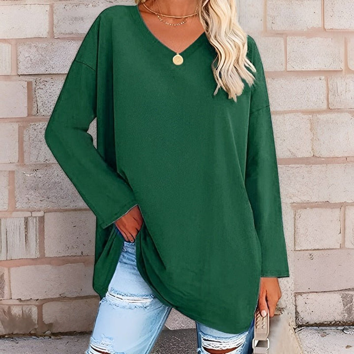Stylish women's V-neck long sleeve sweater, a chic top for versatile casual and elegant outfits.