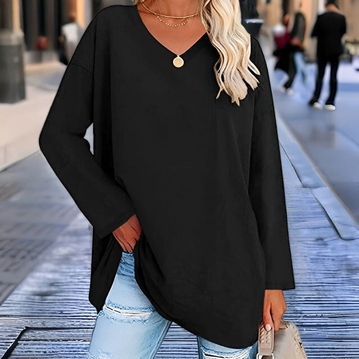 Elegant women's V-neck long sleeve sweater, perfect for combining comfort with modern fashion.