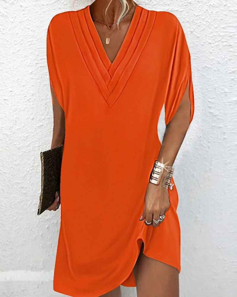 Comfortable & stylish women's V-neck loose fit summer dress. Flowy fabric for warm weather & casual fashion.