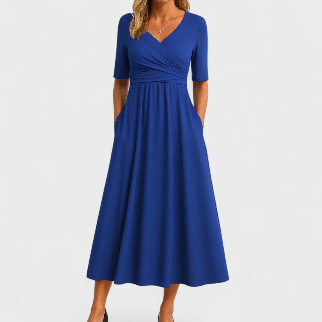 Flattering women's V-Neck Midi Dress featuring stylish crossover waist & practical side pockets.