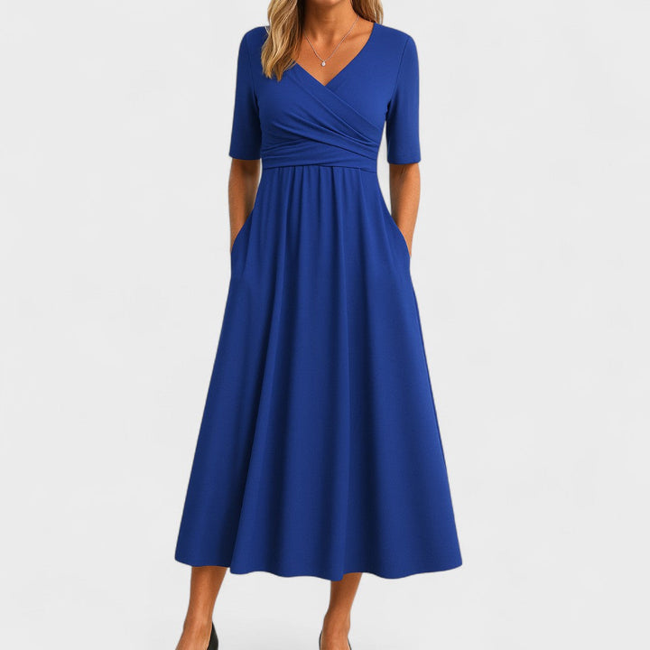 Flattering women's V-Neck Midi Dress featuring stylish crossover waist & practical side pockets.