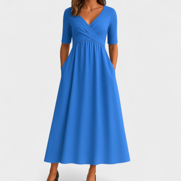 Modern women's V-Neck Midi Dress with a sophisticated crossover waist, offering a flattering silhouette.