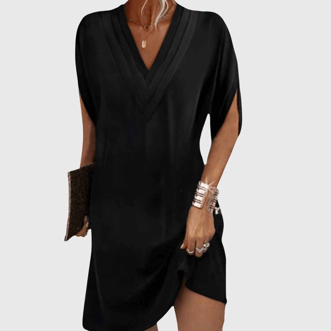 Women's V-neck mini dress with short sleeves & a relaxed, comfortable fit for casual summer style.