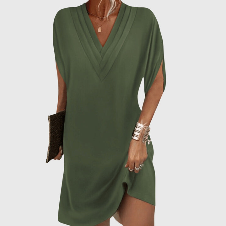 Stylish women's V-neck mini cocoon dress, perfect for relaxed summer days, vacation, or beachwear.