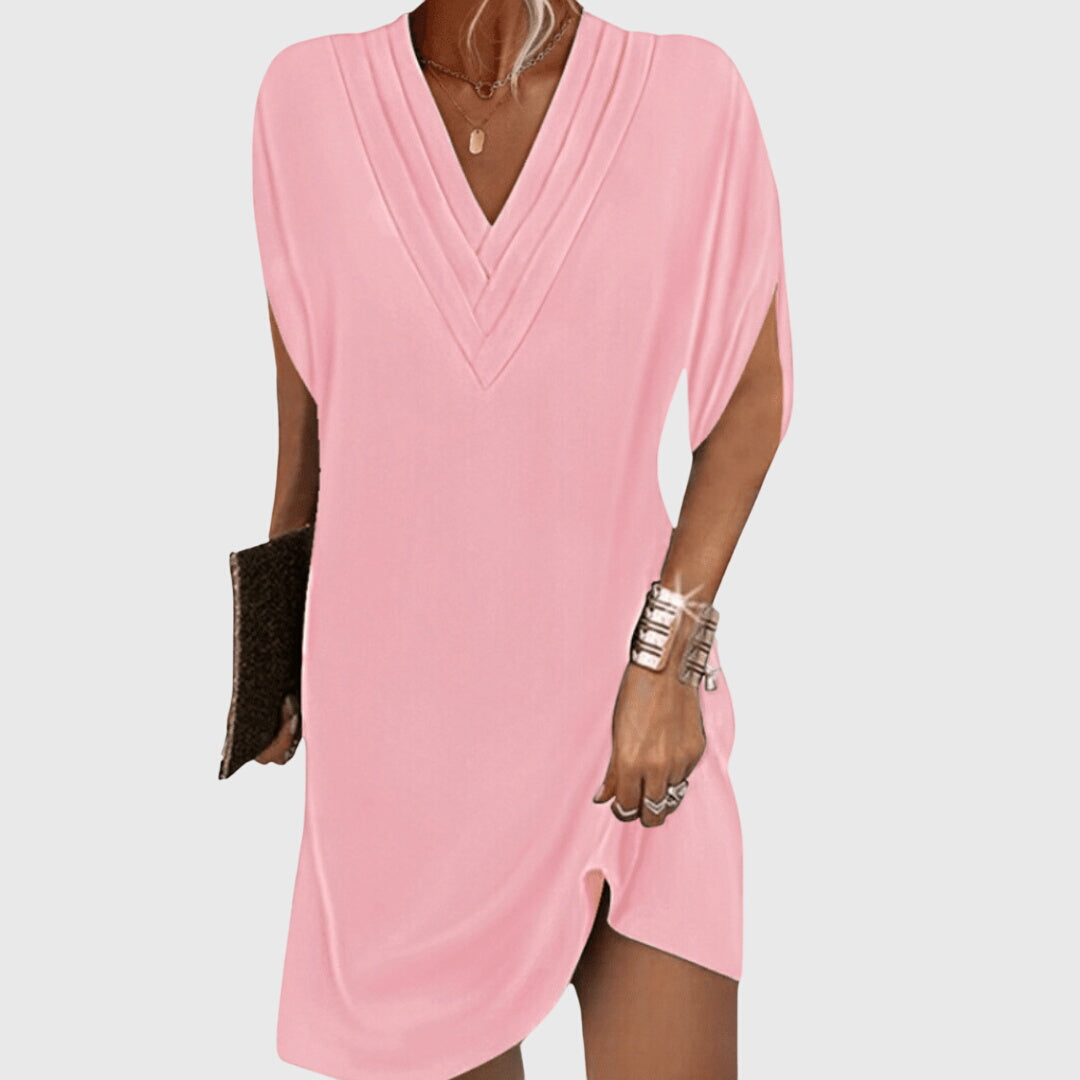 Comfortable short sleeve V-neck mini dress with a draped, relaxed fit, ideal for everyday casual wear.