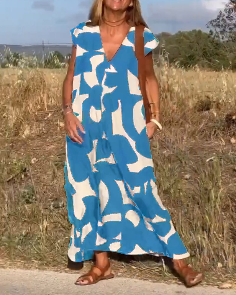 Comfortable V-Neck Maxi Dress with unique print, great for beach or resort wear, A-line style.