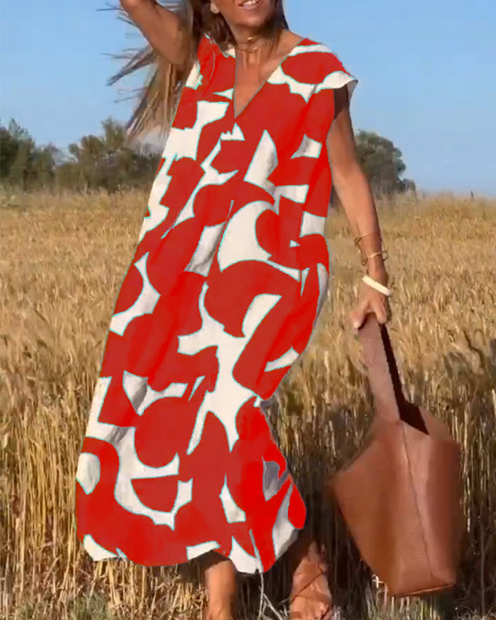 Women's Printed Maxi Dress, V-neck, short sleeve, embodying relaxed summer fashion & elegance.