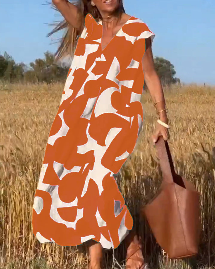 Chic V-Neck Maxi Dress with stunning print, an ideal holiday or casual outfit for women.