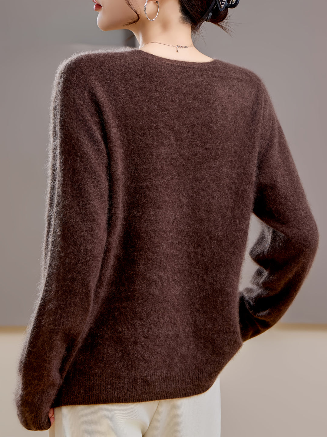 Elegant women's V-neck pullover sweater, versatile for autumn layering & weekend wear.