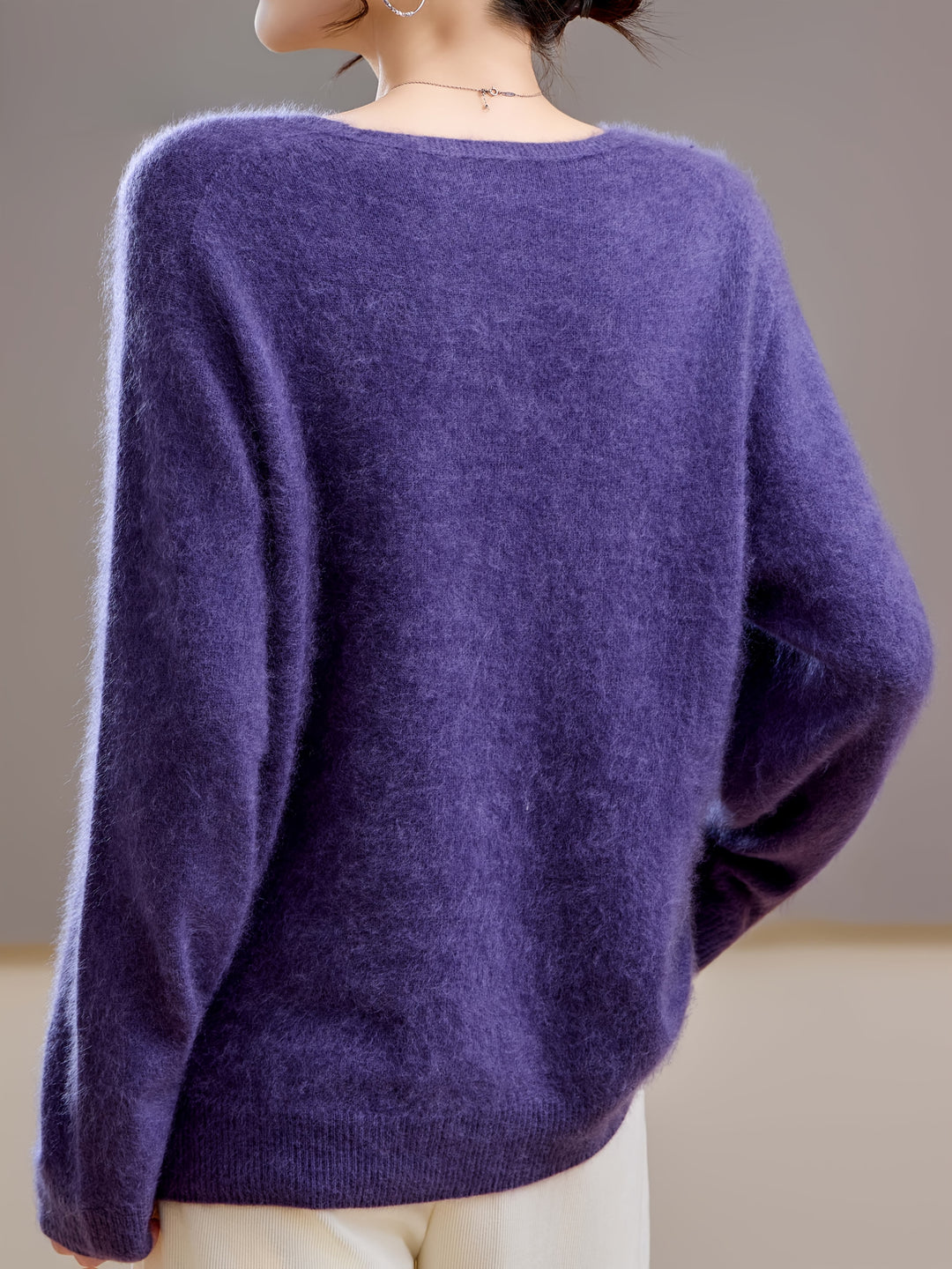 Cozy chic women's V-neck pullover sweater, bringing comfort to autumn outfits.