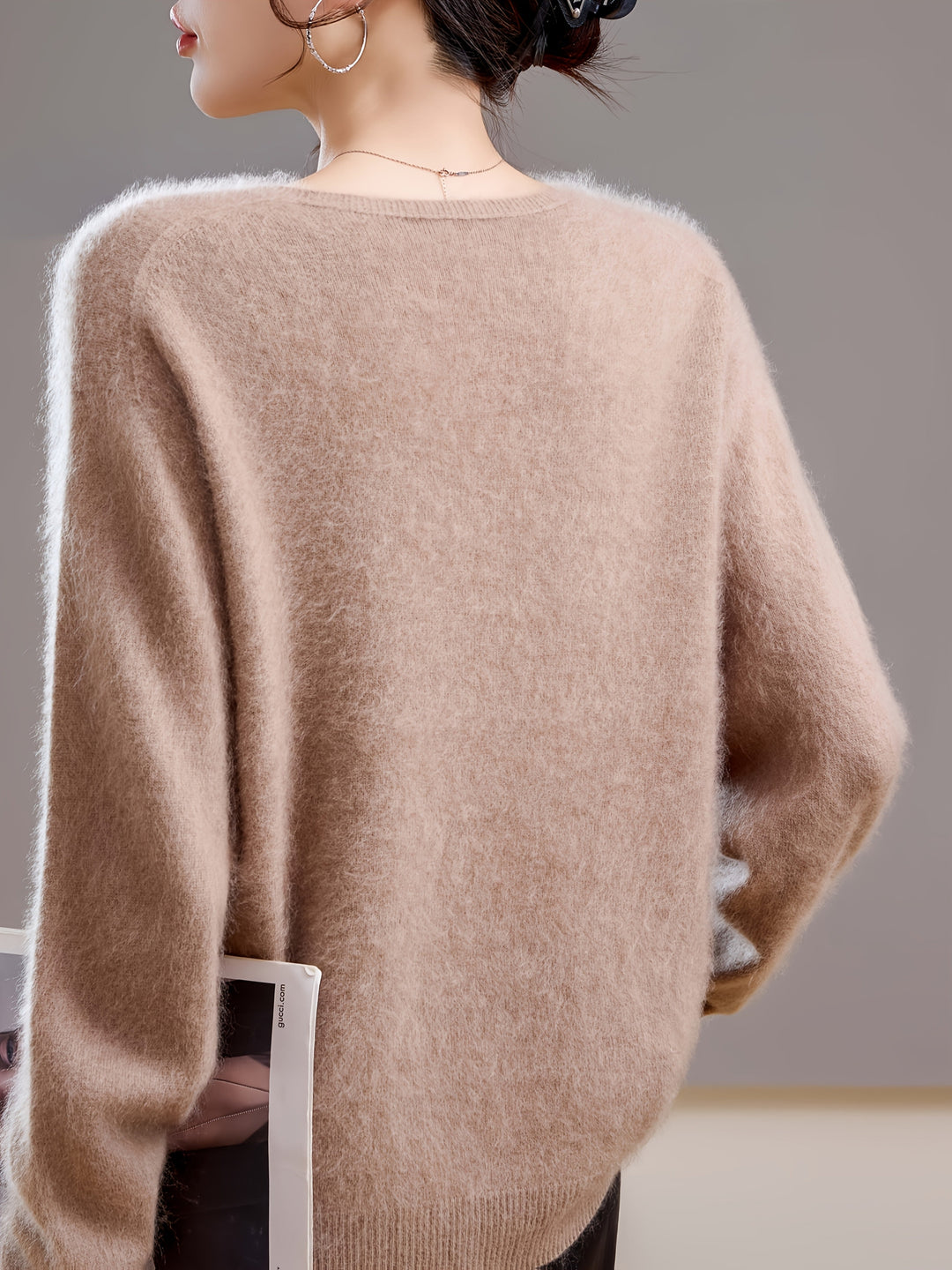 Autumn layering V-neck pullover sweater for women, elegant & comfortable style.