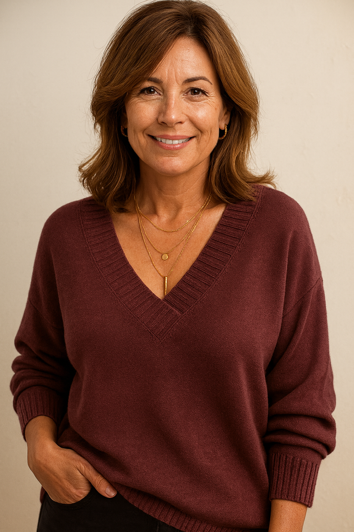 Stylish women's V-neck ribbed sweater, long sleeve, relaxed fit for everyday comfort.