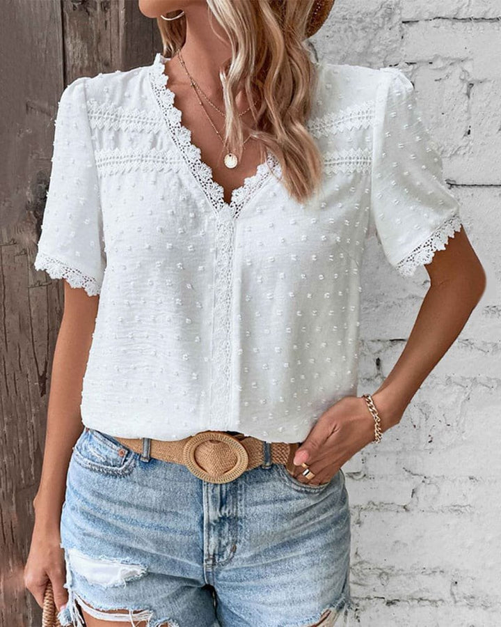 Boho chic women's short sleeve Swiss dot blouse with lace trim. Ideal for spring & summer everyday wear.
