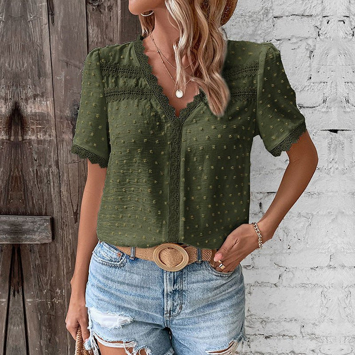 Versatile women's V-neck Swiss dot top with lace trim, great for casual, summer, or spring outfits.