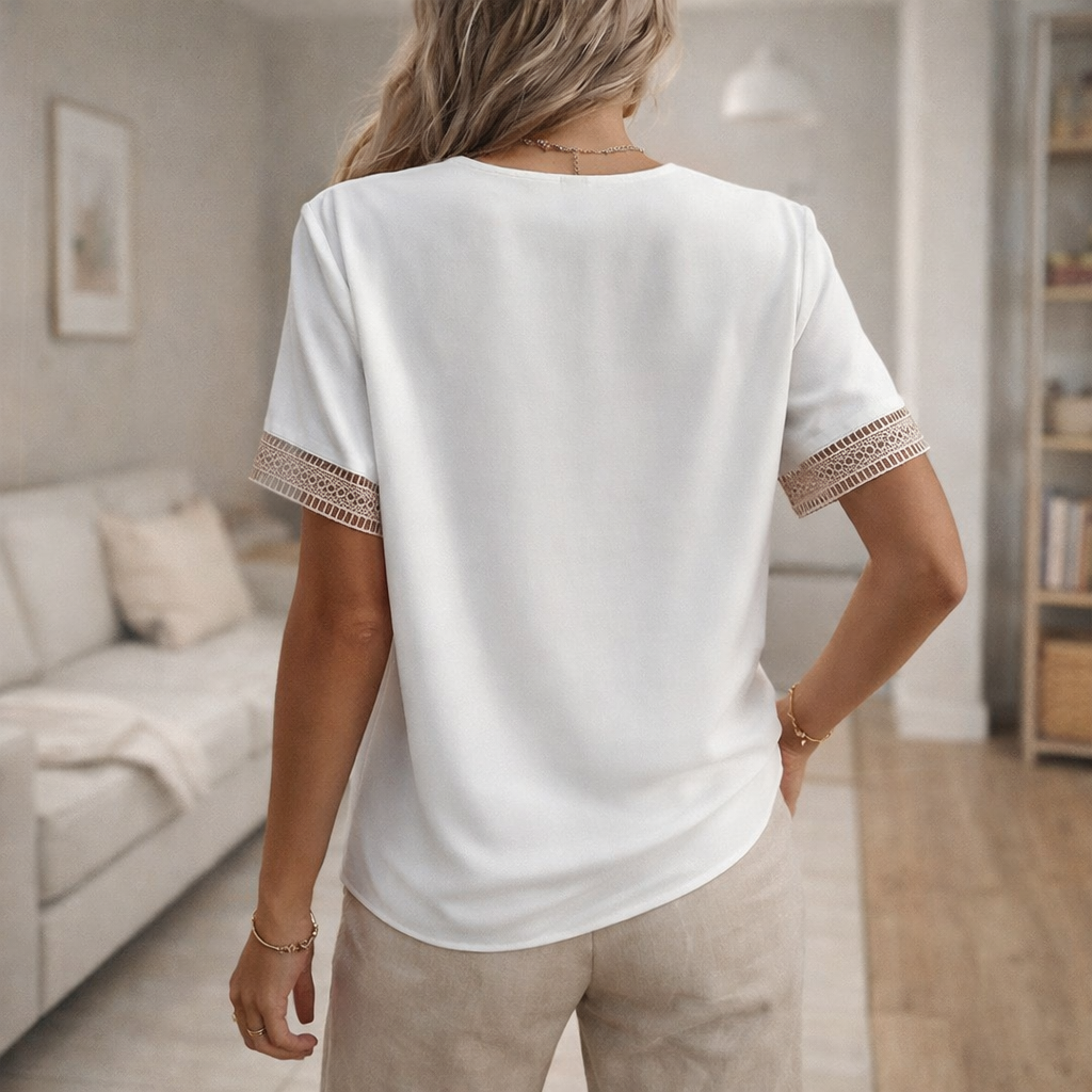 Feminine short sleeve V-neck top with delicate lace trim, ideal for women's spring outfits & casual elegance.