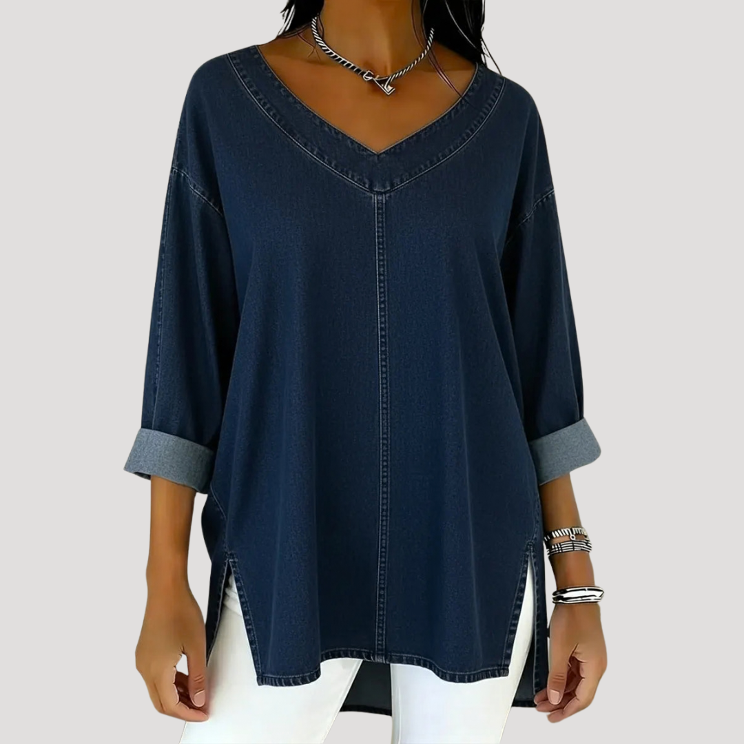 Effortless longline V-neck tunic top for women. Features elbow sleeves, side slits, & a comfortable relaxed fit.