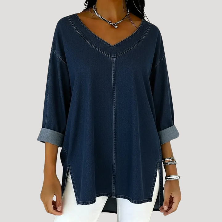 Effortless longline V-neck tunic top for women. Features elbow sleeves, side slits, & a comfortable relaxed fit.
