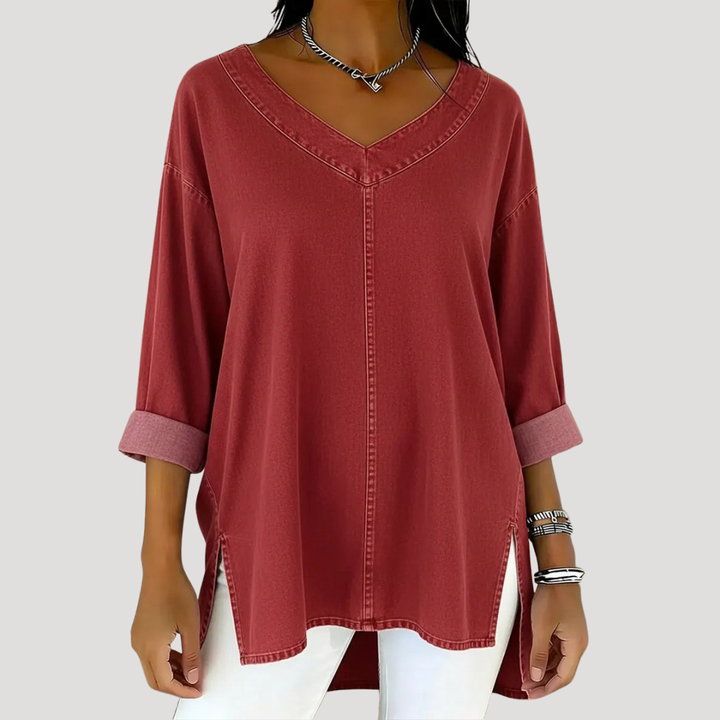 Longline women's V-neck tunic top with elbow sleeves, side slits, & a relaxed fit. Essential for versatile casual outfits.