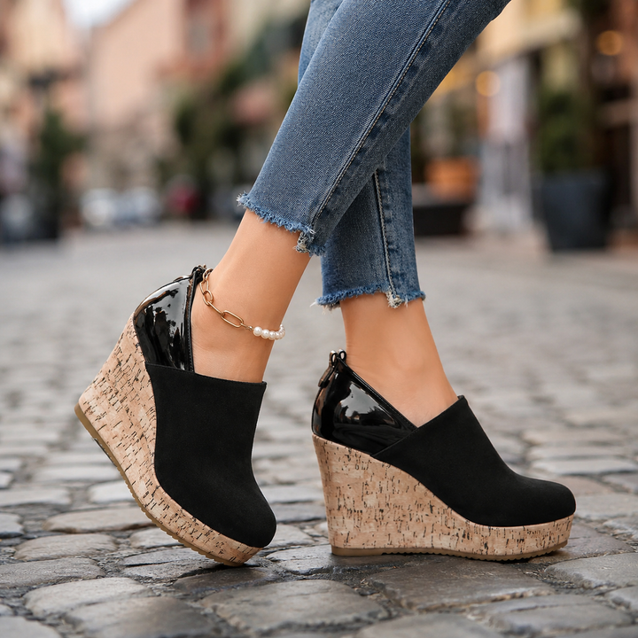 Stylish navy blue Valenza wedge loafers for women, offering orthopedic support and casual comfort.