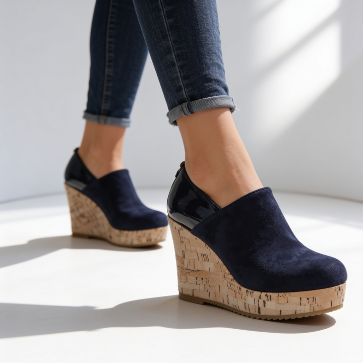Deep black slip-on Valenza wedge loafers for women, combining orthopedic comfort with stylish design.