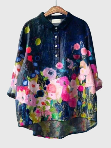 Women's elegant floral print blouse, a long sleeve top for refined spring and summer fashion.