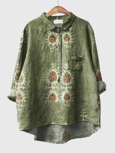 Stylish floral print button-up blouse for women, versatile for office to casual settings.