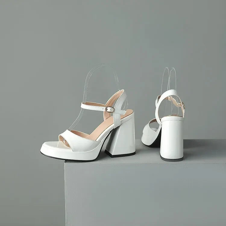 Valetta gloss block heels: women's party shoes with a vibrant finish and comfortable block heel.