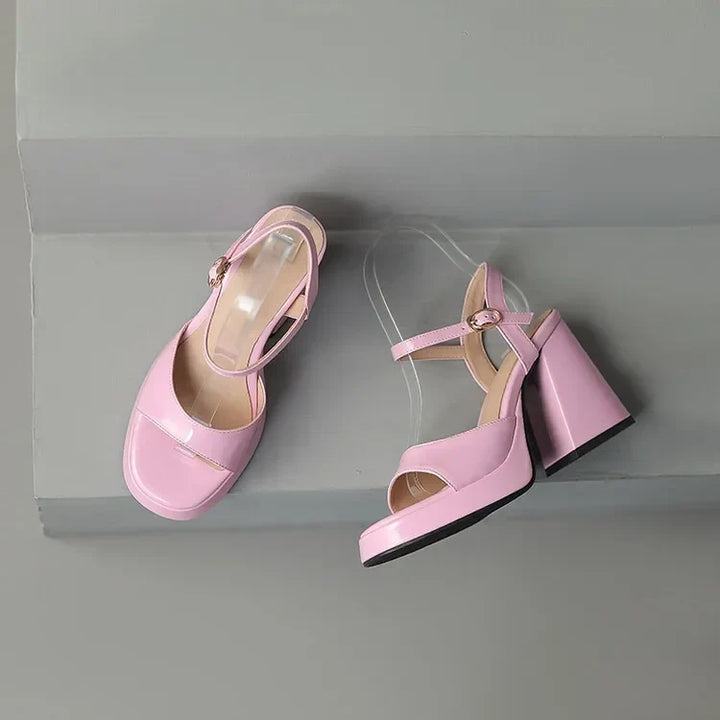 Chic Valetta women's block heels with a glossy finish. Elegant ankle strap dress shoes.