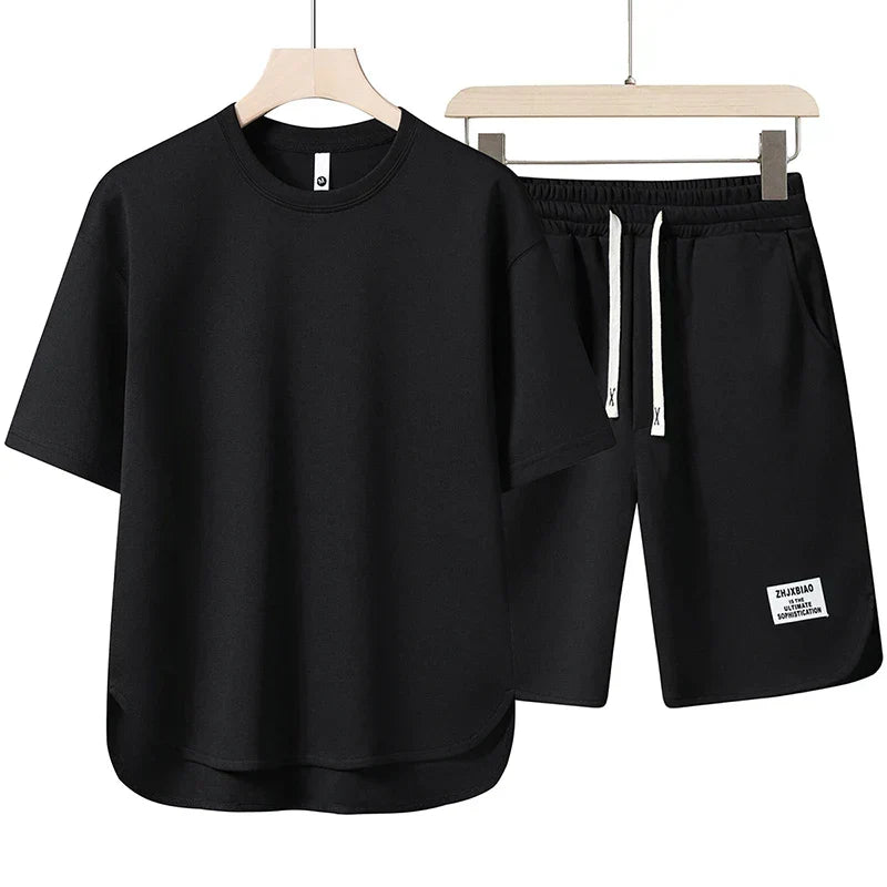 Flat lay of a women's comfortable varsity two-piece shorts set, ideal for lounging or casual outfits.