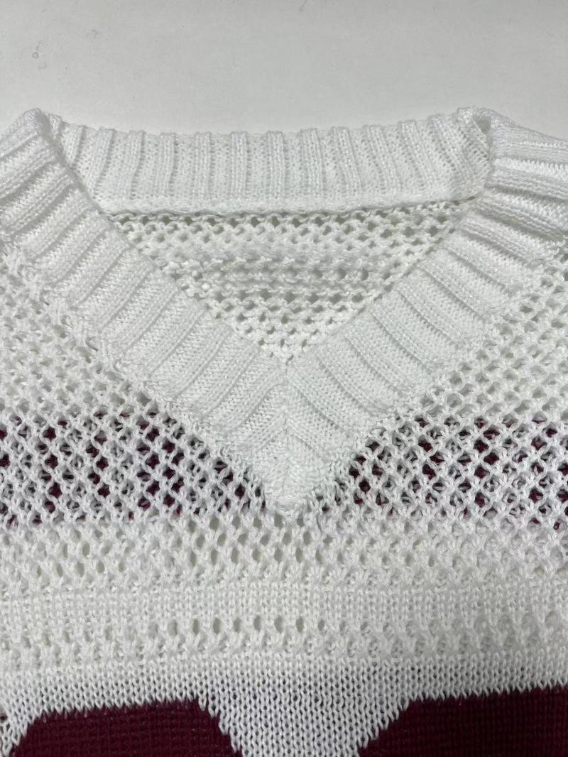 Fashionable women's oversized knit sweater, Verona Varsity style. Essential fall/winter wear.