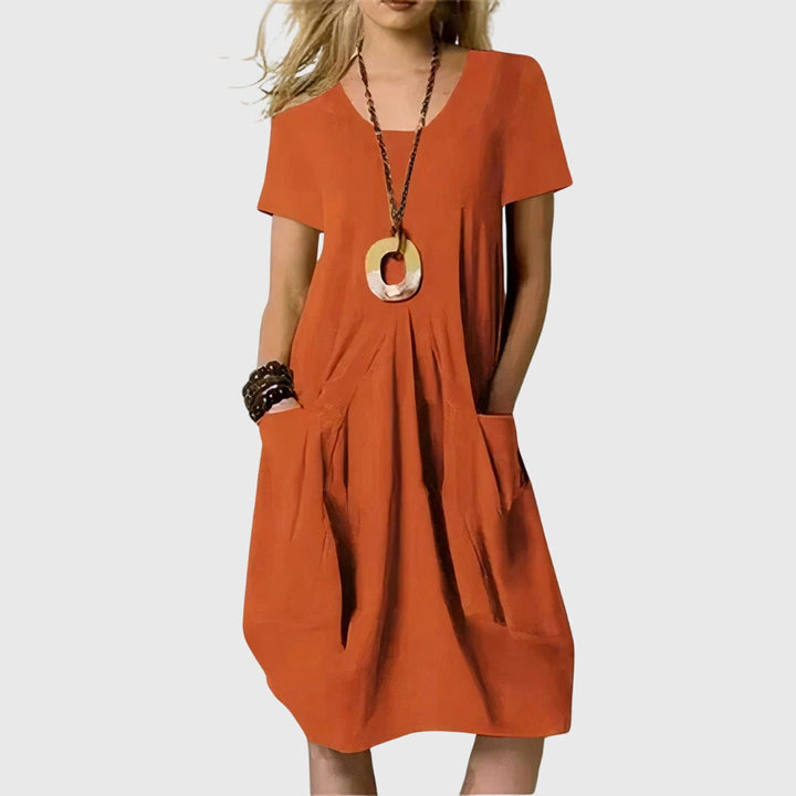 Women's versatile A-line casual dress with practical pockets, perfect for everyday comfortable wear.