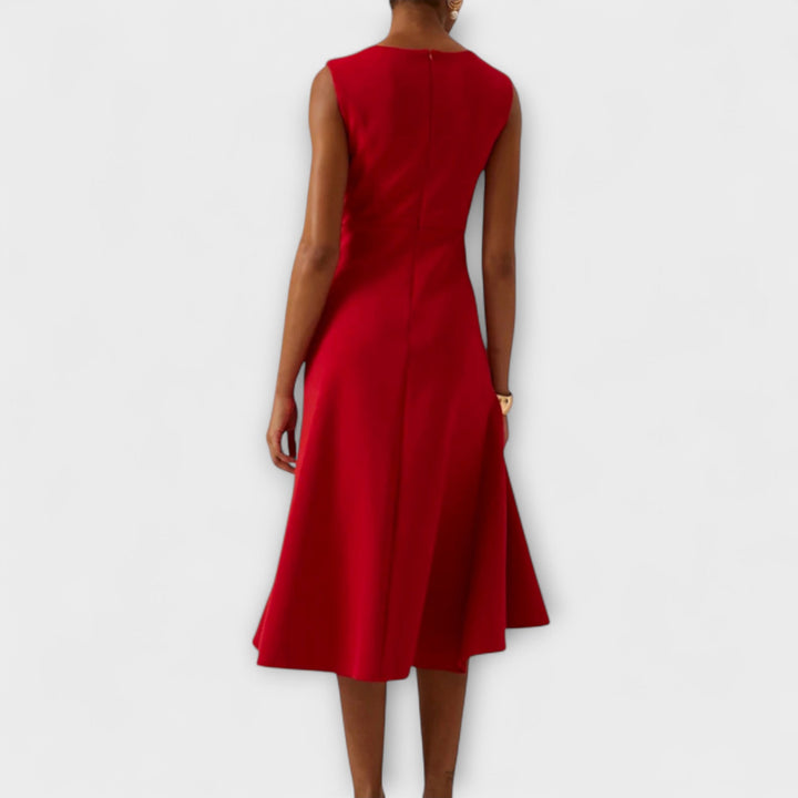 Sleeveless asymmetric midi dress for women, ideal for party & evening events.