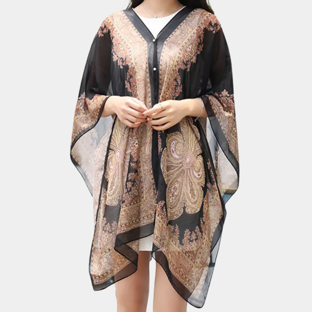 Women's versatile black chiffon poncho scarf, lightweight & elegant fashion accessory. Perfect as a wrap or shawl.