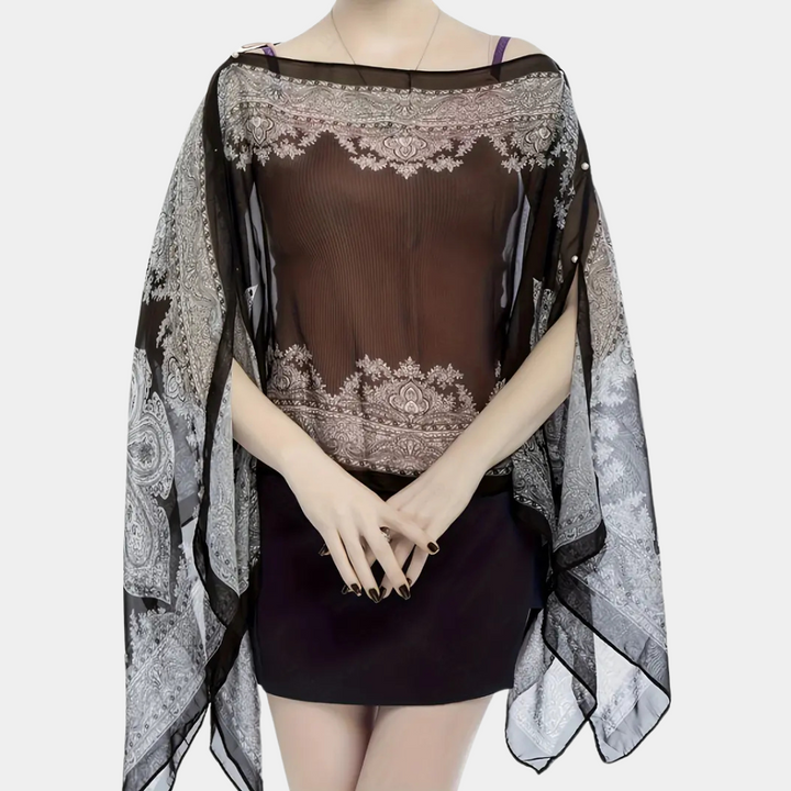 Lightweight black chiffon poncho scarf for women, easily converts to a stylish wrap or elegant fashion accessory.