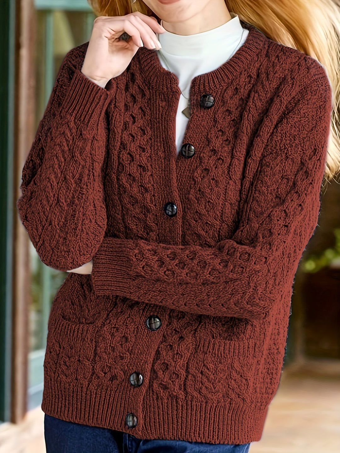 Women's versatile button-down cardigan with pockets, ideal for fall and winter layering fashion.