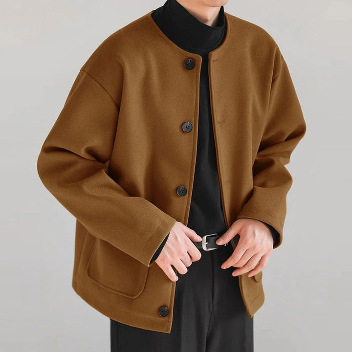 Stylish women's button-up cardigan jacket, featuring practical front pockets for everyday chic.